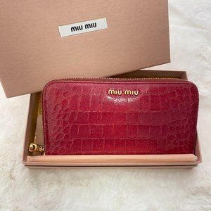 Miu Miu embossed leather zip around wallet